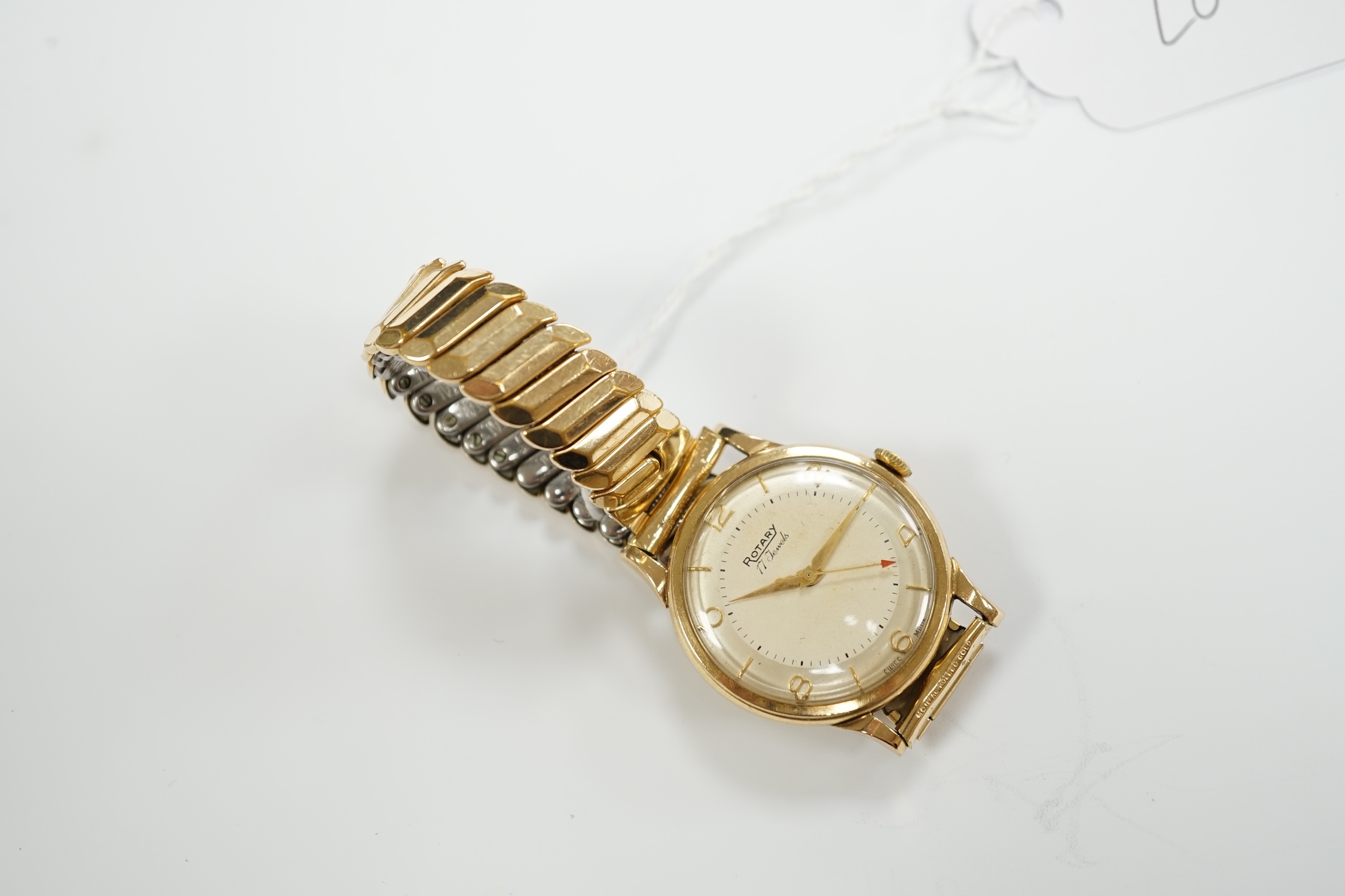 A gentleman's 1950's 9ct gold Rotary manual wind wrist watch, with associated steel and gold plated flexible bracelet.